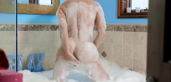  Stepson spying on his stepmom while she takes a bath